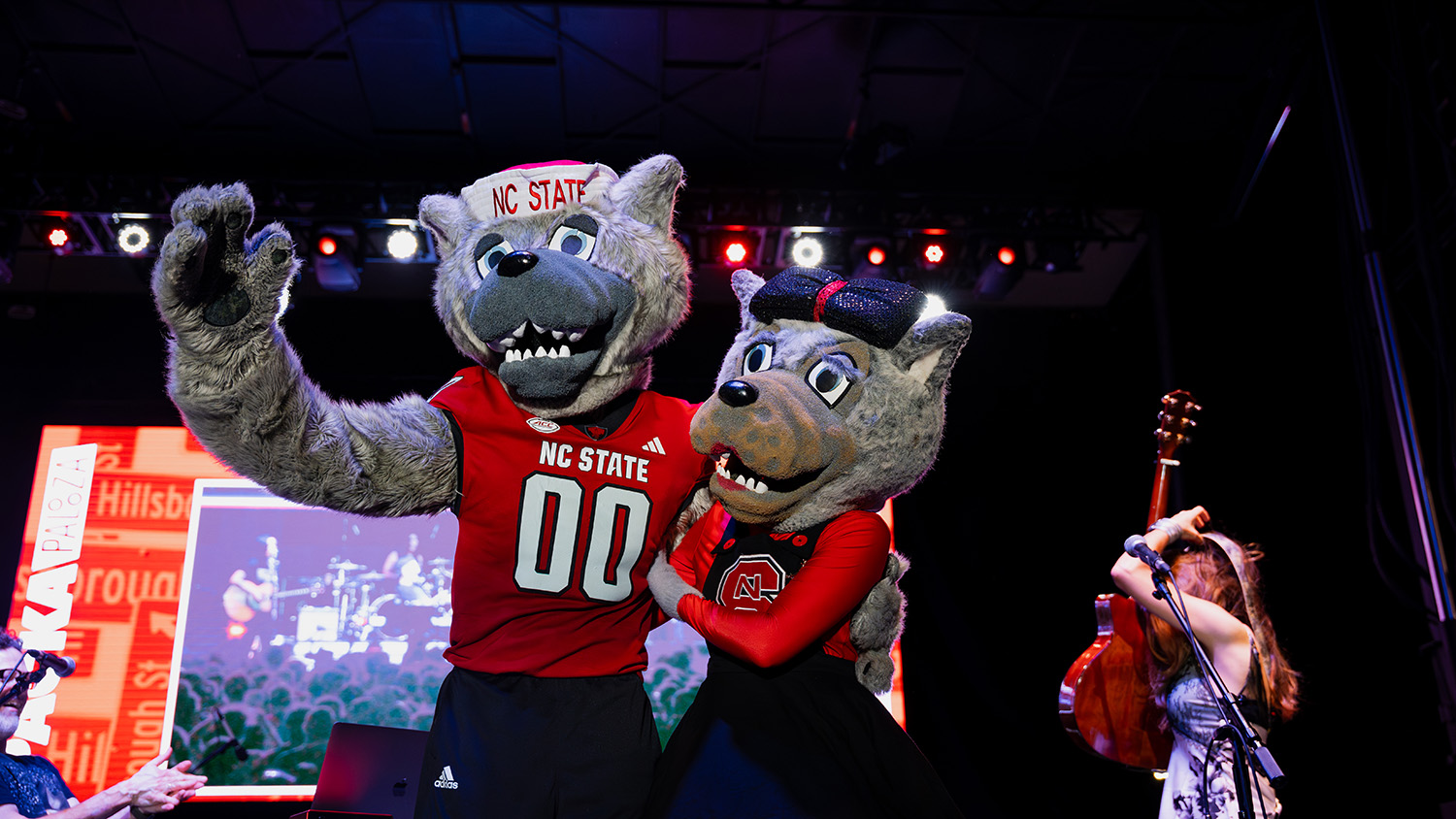 Mr. Wuf and Ms. Wuf on stage at Packapalooza.